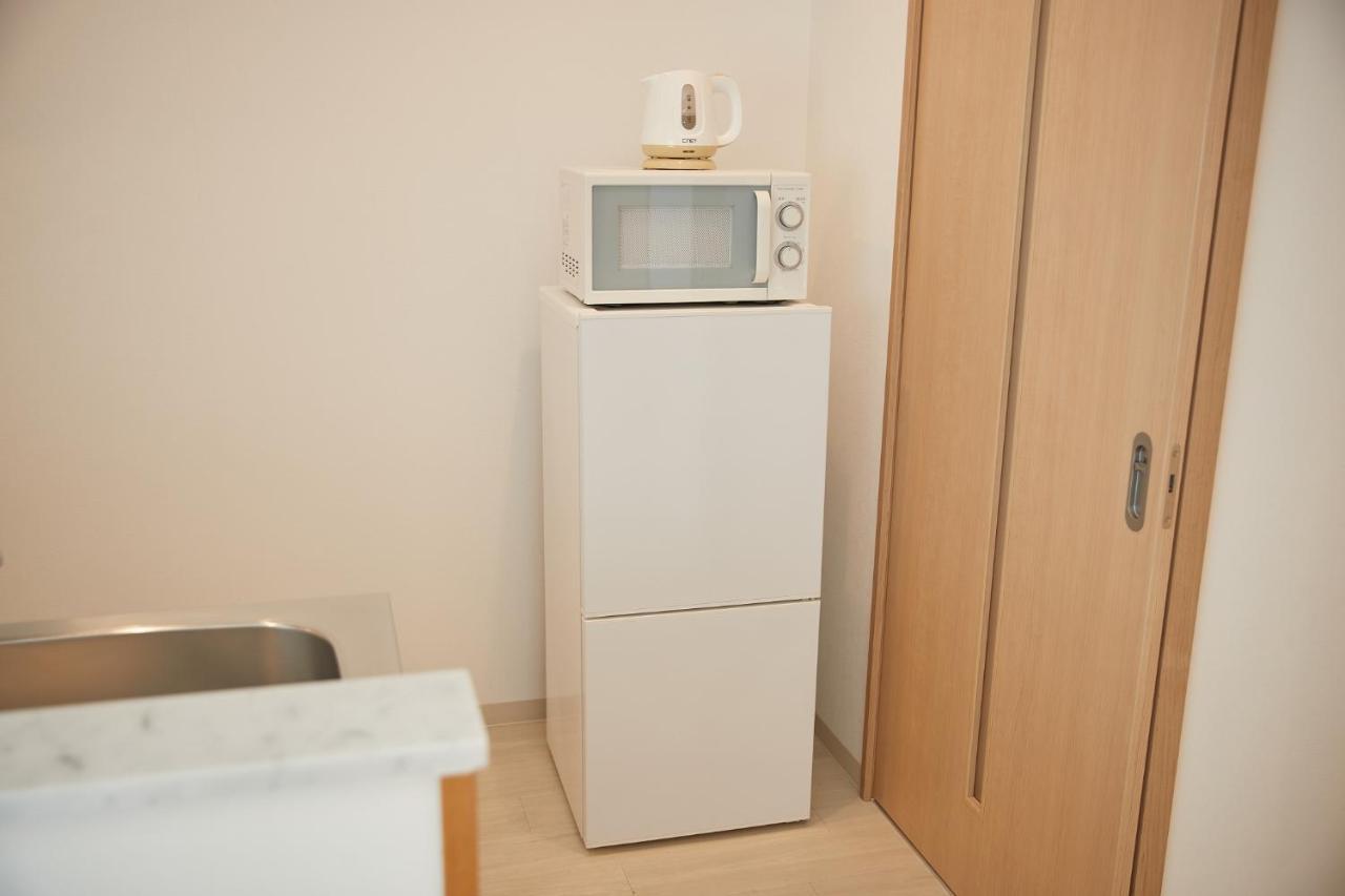 New Normal Hotel In Nago ニューノーマルホテルイン名護 Exteriör bild